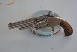 Smith & Wesson Revolver
New Model
1 1/2 32 RF - 1 of 12