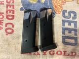 Two Taurus pt 24/7 45 acp 12 round magazines - 1 of 2