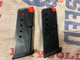 2 Taurus pt 740 .40 s&w 9 round magazines