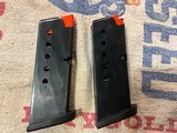 2 Taurus pt 740 .40 s&w 9 round magazines - 1 of 2