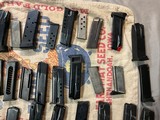 60 assorted magazines Lorcin,Bersa,Taurus, ramline, pro mag,beretta,ruger, smith &wesson - 9 of 10