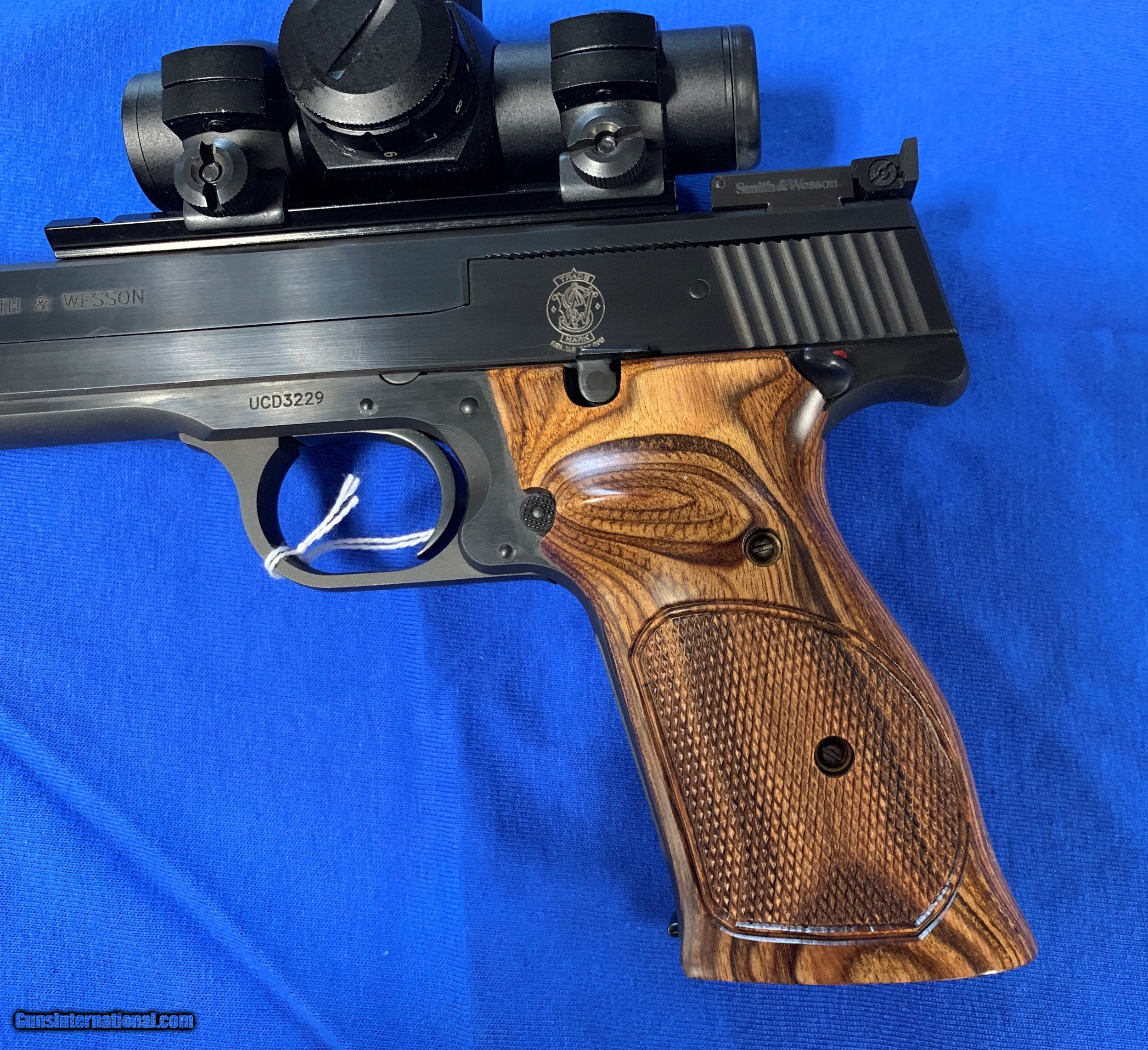 Smith and Wesson Model 41 .22 caliber target pistol with ADCO red dot sight