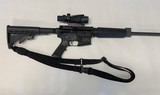 Smith and Wesson M&P 15 .556 Rifle with Trijon ACOG optic.