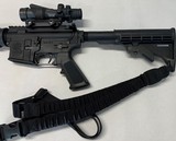 Smith and Wesson M&P 15 .556 caliber rifle with Trijicon ACOG TA31RCO-A4 Optic, sling, hard case and eleven magazines - 3 of 10