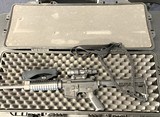 Smith and Wesson M&P 15 .556 caliber rifle with Trijicon ACOG TA31RCO-A4 Optic, sling, hard case and eleven magazines - 9 of 10