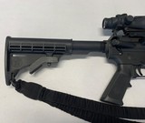 Smith and Wesson M&P 15 .556 caliber rifle with Trijicon ACOG TA31RCO-A4 Optic, sling, hard case and eleven magazines - 6 of 10