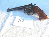 Smith and Wesson Model 48. 22mag revolver. it has a 6" bbl. with a 6 round capacity. - 1 of 6