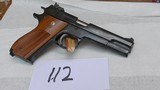 Smith and Wesson Model 52-2. 38SPL. Cal. Semi-Auto.
It has the the Box - 2 of 9