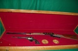 Oliver Winchester & Samuel Colt Commemoative Set94-Winchester SAA Colt 44-40 Matching Serial No. Oak Display Case - 2 of 14