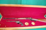 Oliver Winchester & Samuel Colt Commemoative Set94-Winchester SAA Colt 44-40 Matching Serial No. Oak Display Case - 3 of 14