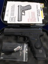 Glock 22 w/laser & Night Sights - 1 of 13