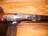 SPRINGFIELD 1873 OFFICERS MODEL TRAPDOOR
H&R CENTENIAL 1871-1971
NEW UNFIRED IN THE ORIGINAL BOXES - 13 of 15