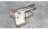Colt ~ 1908 Hammerless ~ 25 Auto - 1 of 2
