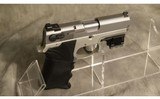 SMITH & WESSON ~ 4013TSW ~ .40 S&W - 1 of 3