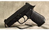 Sig Sauer~P320~9mm luger - 3 of 4