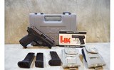 H&K~USP Compact~.40 S&W - 2 of 4
