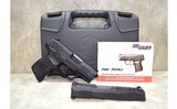 SIG Sauer~P365~9mm Luger & .380 Auto - 1 of 4