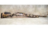 Mossberg~835~12 gauge