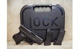 Glock~27~.40 S&W - 2 of 5