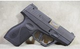 Taurus~709 Slim~9mm Luger - 1 of 4
