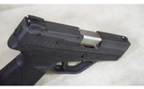 Taurus~709 Slim~9mm Luger - 3 of 4
