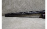 Remington~1100~12 gauge - 11 of 16
