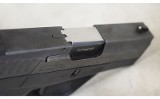 Taurus~PT709 Slim~9mm Luger - 6 of 9