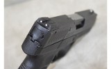 Taurus~Pt 709 Slim~9mm Luger - 3 of 7