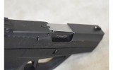 Taurus~Pt 709 Slim~9mm Luger - 4 of 7