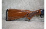 Remington~1100~12 gauge - 2 of 13