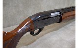 Remington~1100~12 gauge - 7 of 13