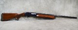 Remington~1100~12 gauge - 1 of 13