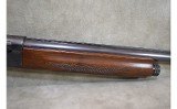 Remington~11~12 gauge - 4 of 13