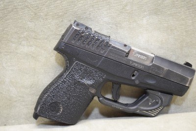 Taurus~709 Slim~9mm Luger - Image 1 of 8