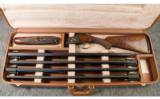1958; 12 Gauge Browning Superposed Grade VI w/ Simmons Gun Company 3 Caliber Skeet Set - 1 of 9