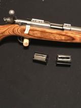 RUGER VARMIT 77 / 22 MAGNUM STAINLESS W / LAMINATED STOCK - 1 of 4