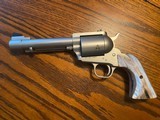 Custom .500 JRH Freedom Arms revolver with fossil mammoth ivory grips